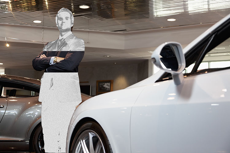 Venditore di auto (stilizzato in bianco) nel suo luogo di lavoro